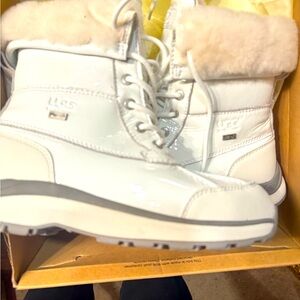 UGG Adirondack Boot III Patent White
New w/tag.  Size 8